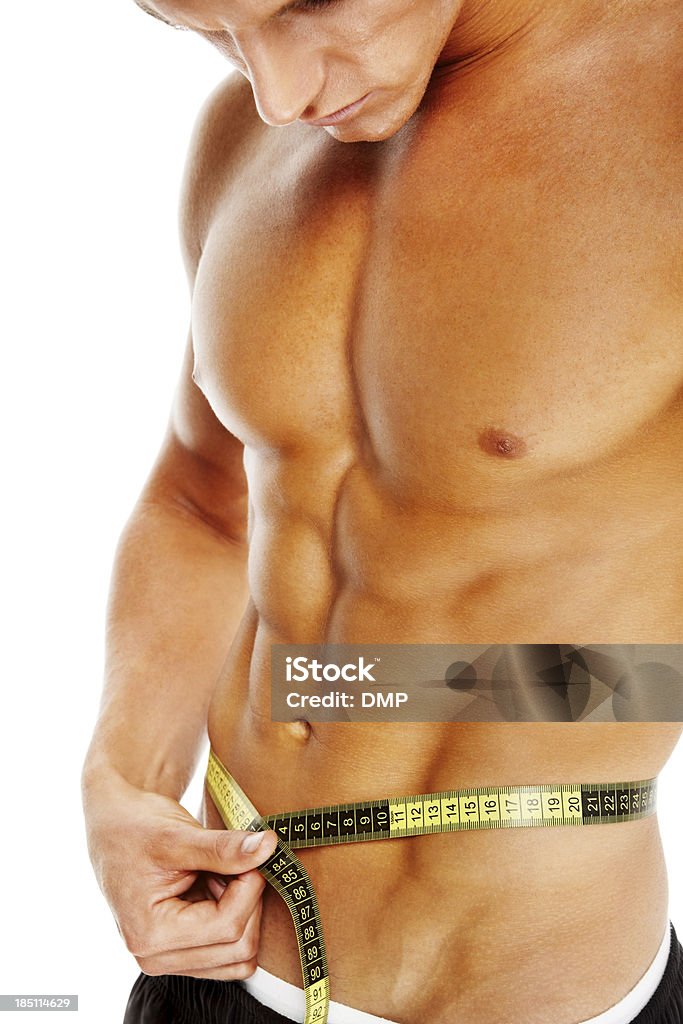 Muscular jovem medir sua abs - Royalty-free Abdómen Foto de stock