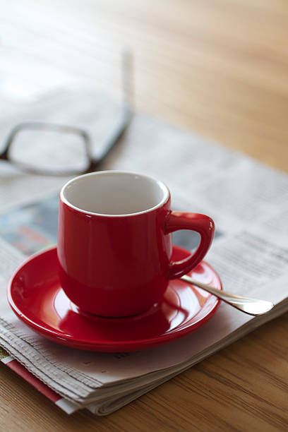 istock Red espresso cup on a wooden table 185114723