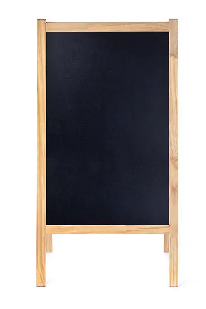 A blank restaurant menu blackboard sign easel isolated on white background. Designed with copy space and background for custom text and copy. The wood framed easel is photographed in vertical format.