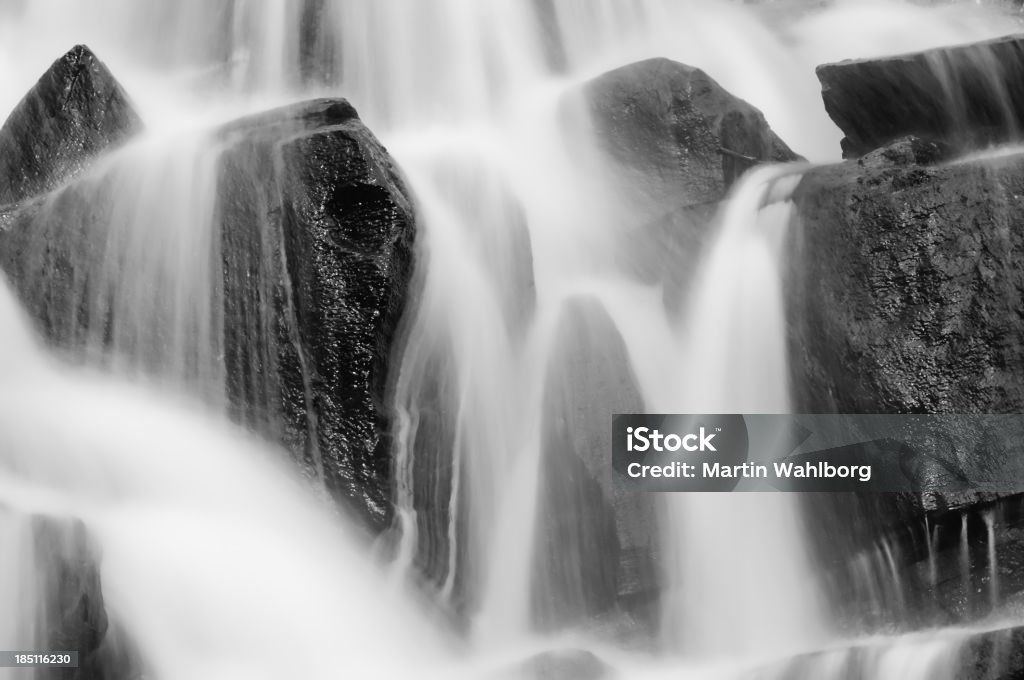 Waterfall black and white Waterfall and black stones Beauty In Nature Stock Photo