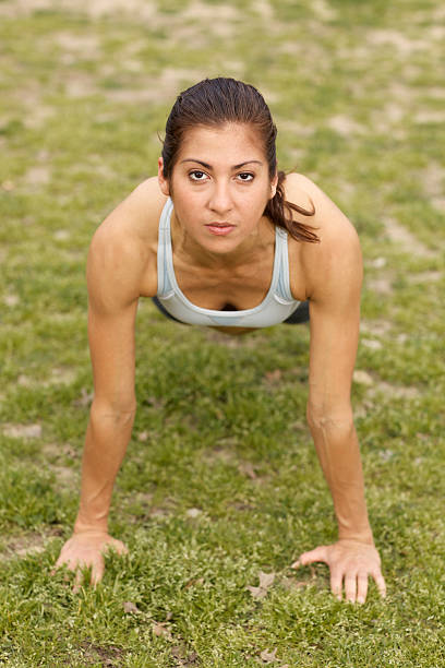 Young Hispanic woman exercising outdoors