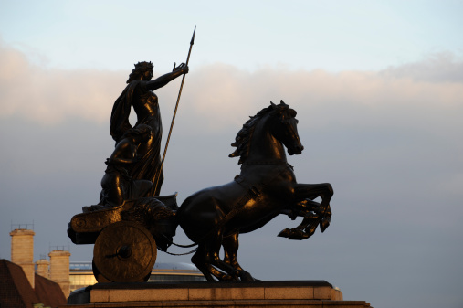 The famous boadicea statue by Thomas Thornycroft. In Westminster London England. Taken late in the afternoon on a winters day with some golden sunshine illuminating the statue. No filters were used on this file.