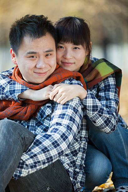istock Happy Young couple outdoors portrait 185117401