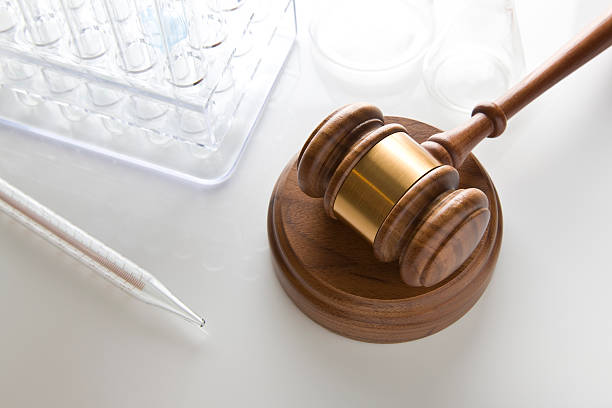 Gavel & Laboratory Equipment "Laboratory Equipment on reflective surface with gavel, CLICK TO SEE MORE!" food and drug administration photos stock pictures, royalty-free photos & images