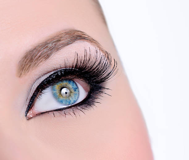 istock woman blue eye macro 185117673