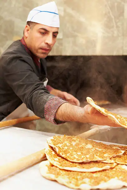 Chef making lahmacun -Turkish pizza-