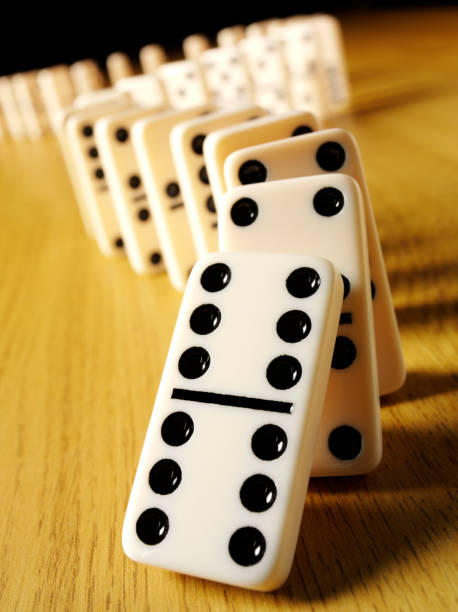 istock Dominoes Falling in the Domino Effect 185118326