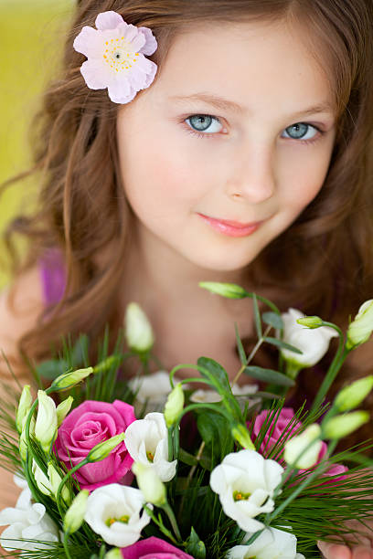 istock Cute girl with flowers. 185118493