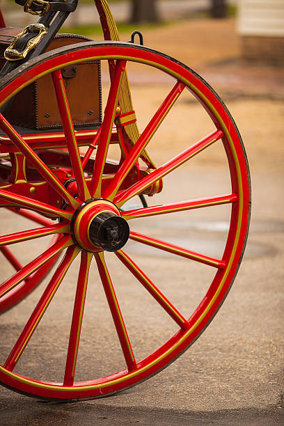 detail of  red wheel of an antique american horse carriage