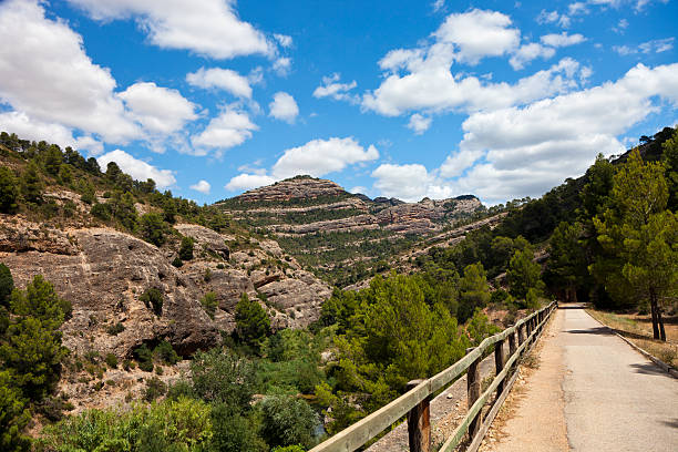 Via Verde (XXXL) The Via Verde is a recreational path for cycling, horse-riding and hiking that used to be a railroad track. It runs from the Terra Alta region in the province of Catalonia down to the banks of the Ebro river. via verde spain stock pictures, royalty-free photos & images