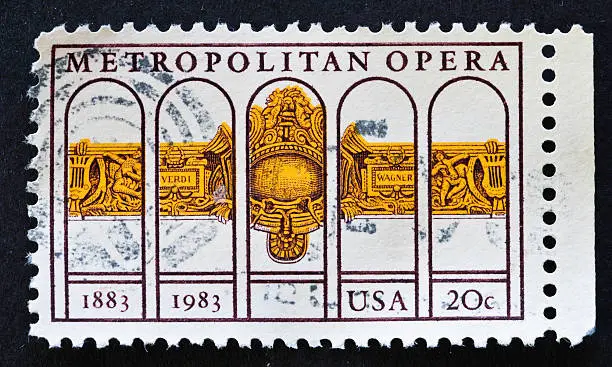 "A 20-cent commemorative stamp marking the 100th anniversary year of the founding of the Metropolitan Opera was issued in New York City on September 14, 1983.  .The Met opened its doors October 22, 1883. The original Metropolitan Opera House was   located on Broadway and 39th streets. The company moved into the new Metropolitan Opera House in 1966. It is part of the Lincoln Center for the Performing Arts"