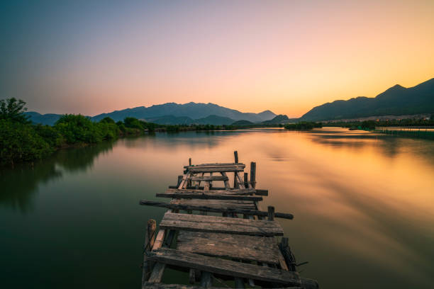 istock Abandoned wooden bridge on Quan Tuong river 1851190433