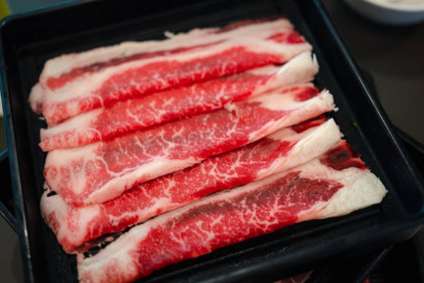 premium rae beef in shabu restaurant. - buffet japanese cuisine lifestyles ready to eat imagens e fotografias de stock