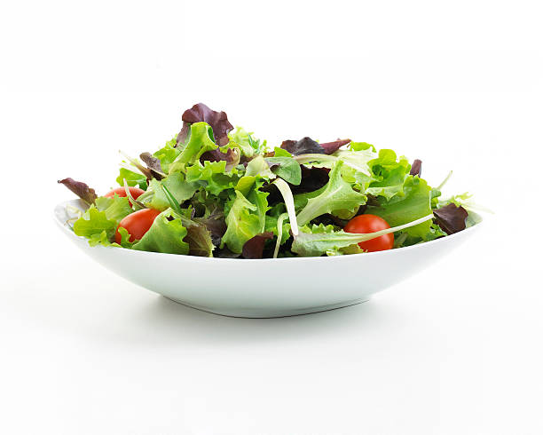 plate of Salad plate of Salad isolated on white low carb diet photos stock pictures, royalty-free photos & images
