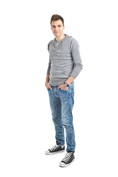 istock young handsome man in grey blouse 185120058
