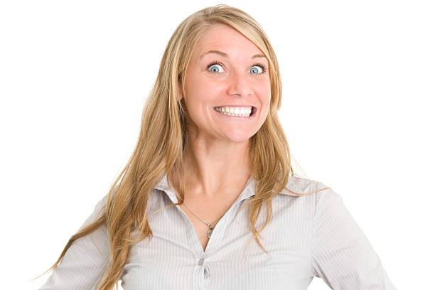 Crazy Smiling Woman Portrait of a woman on a white background. http://s3.amazonaws.com/drbimages/m/er.jpg cheesy grin photos stock pictures, royalty-free photos & images