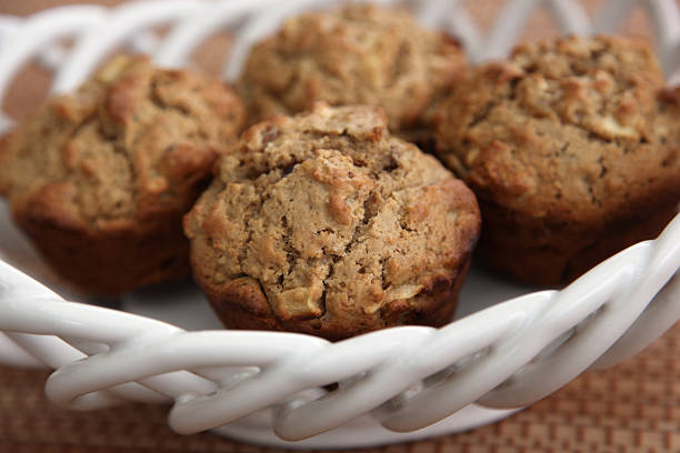 istock Healthy Apple, Apricot, and Walnut Muffins in Basket 185120940
