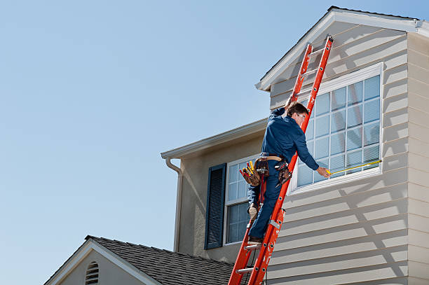 istock Handyman In Uniform Measuring Window 185121358