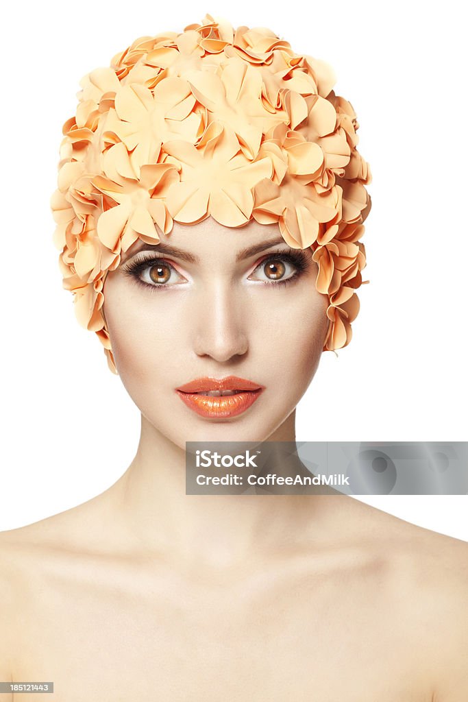Beautiful woman Studio shot of young beautiful woman on white background. Professional make up Swimming Cap Stock Photo
