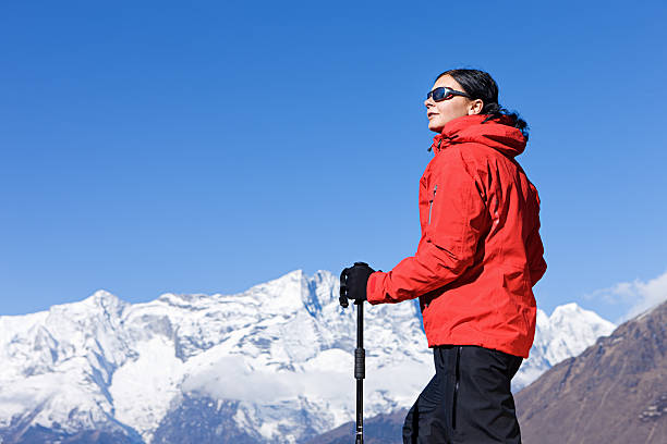 istock Woman trekking  in Himalayas, Nepal 185121447