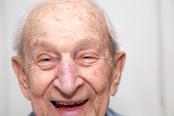 istock Senior man laughing, close up 185122064