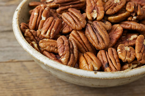 Fresh pecans isolated on white background