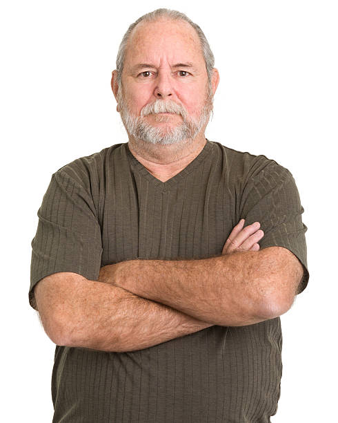 Portrait of a senior man on a white background.