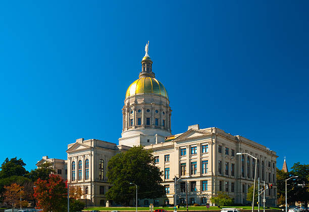 A full photo of the Georgia State Capitol Building Georgia State Capitol building, houses the State Government offices and the General Assembly.  Built in the Neo-Classical architectural style with a gold leaf dome. georgia us state stock pictures, royalty-free photos & images