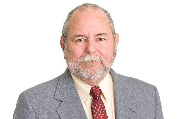 Portrait of a senior man on a white background.