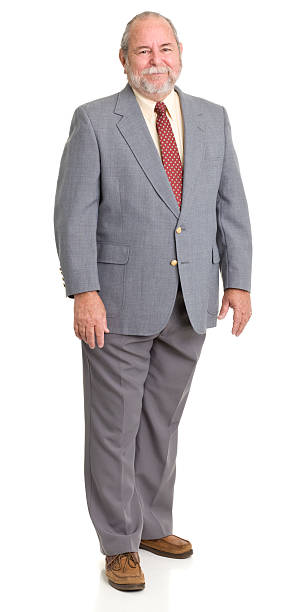 стоя старший мужчина в костюме - overweight men suit business стоковые фото и изображения