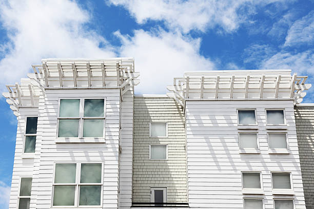 istock white San Francisco home windows against blue sky 185123536