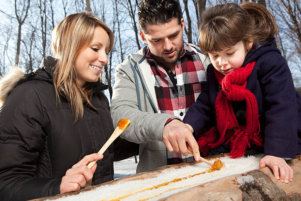 istock Family eating maple taffy 185123570