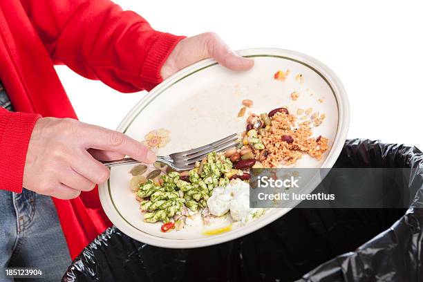 Emptying Food Leftovers Into Rubbish Bin Stock Photo - Download Image Now - Food, Garbage, Leftovers