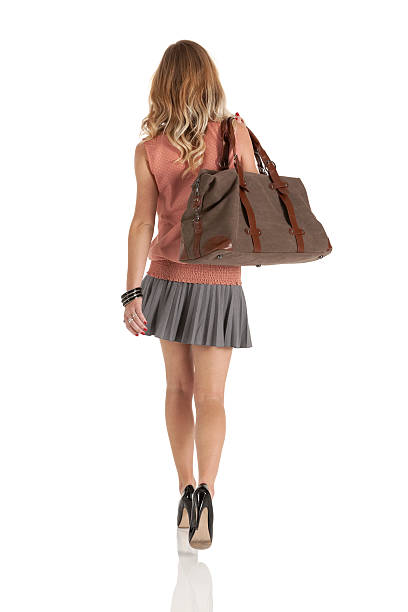 istock Woman carrying a hand bag 185123922