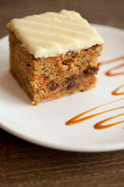 Carrot cake Carrot cake on a white plate. carrot cake stock pictures, royalty-free photos & images