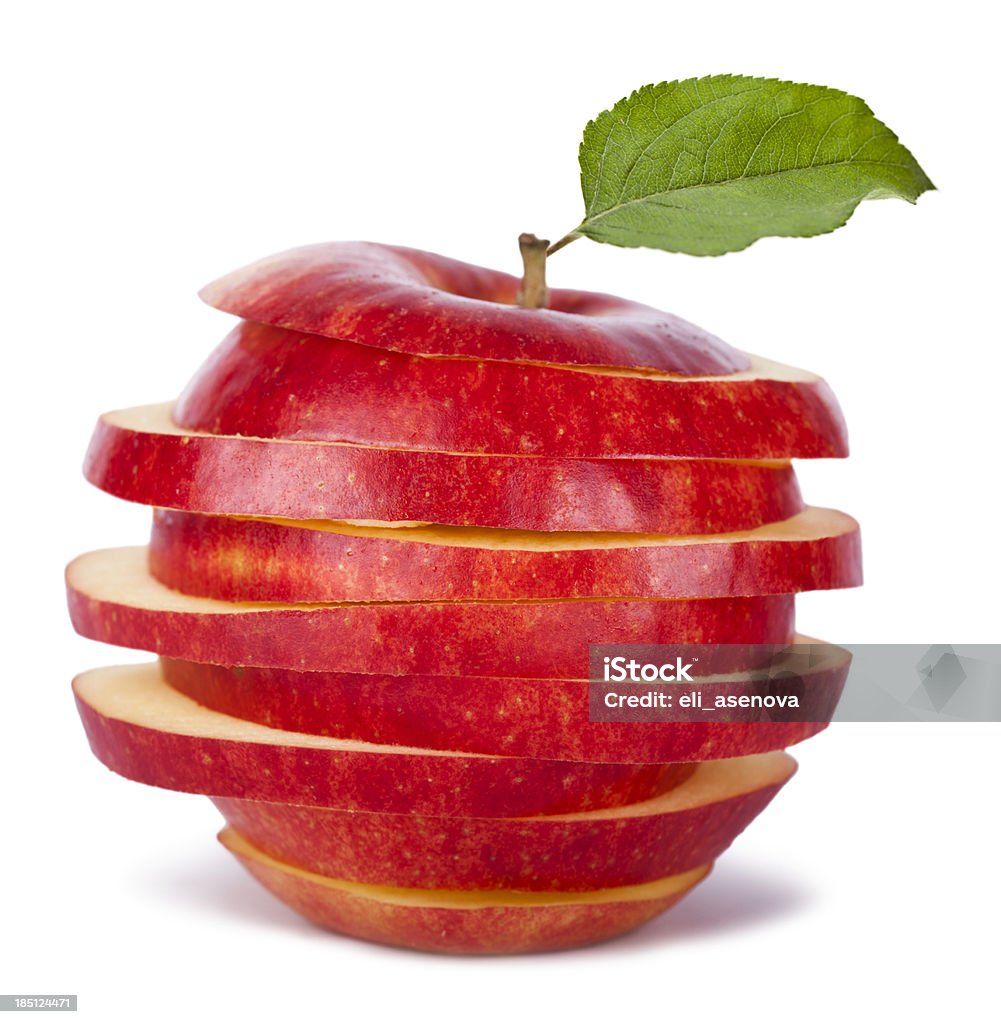 Rodajas de Red Apple y hoja - Foto de stock de Manzana libre de derechos