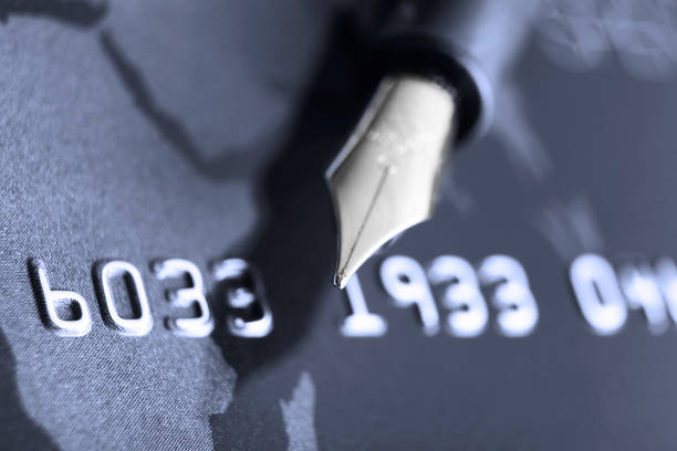 istock credit card and ink pen 185124806