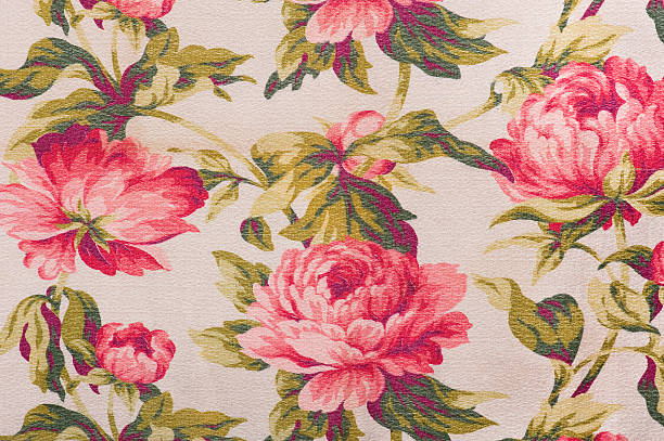 Antique floral fabric with clusters of pink flowers on a beige background..Take a look at my LIGHTBOX of other related images.