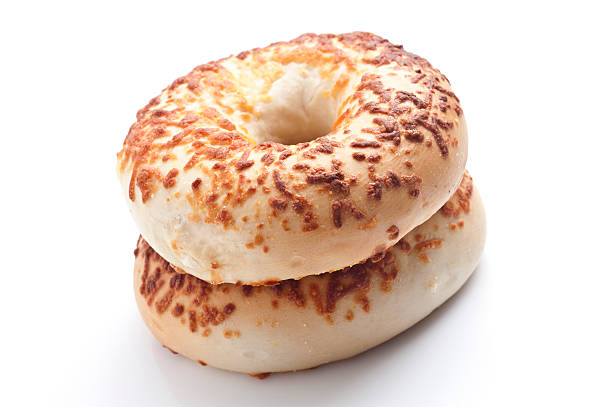 istock Two asiago cheese bagels on a white background 185125465