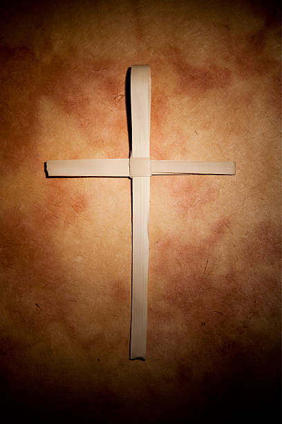 istock Palm Cross on Parchment Paper 185125504