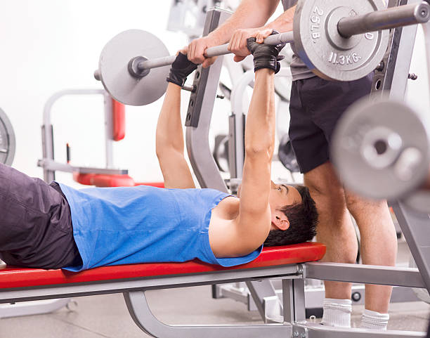 istock young man in the gym 185125507