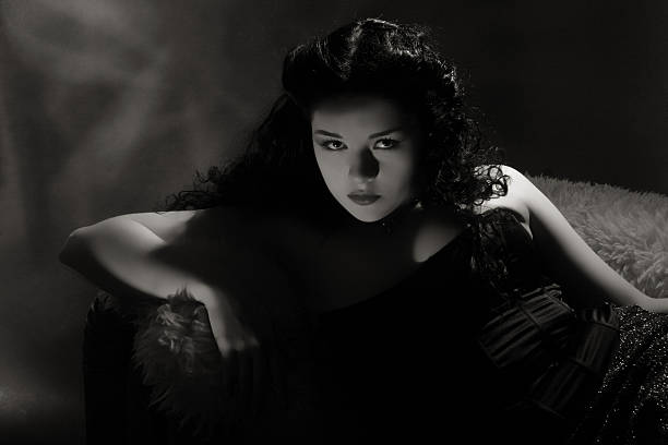 istock Noir style.Woman in Shadow. 185125611