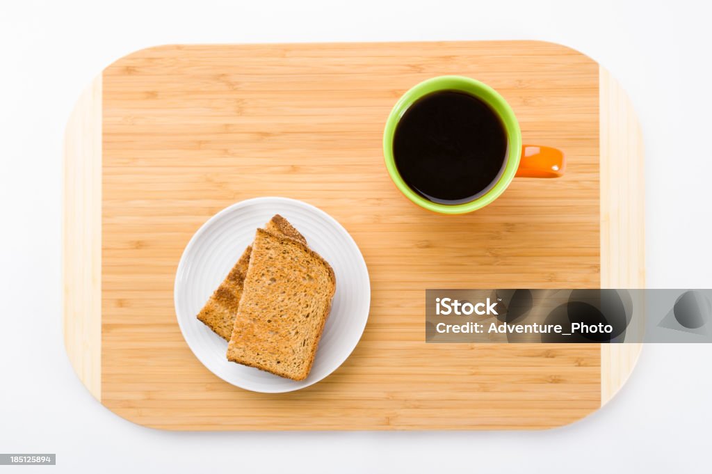 Toast e caffè per la prima colazione - Foto stock royalty-free di Ambientazione interna
