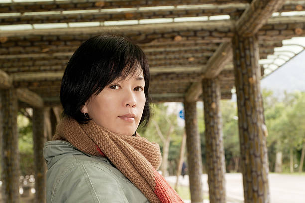 istock Asian woman in park 185125946
