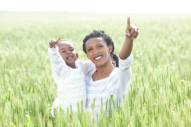 Mother and daughter in the nature.