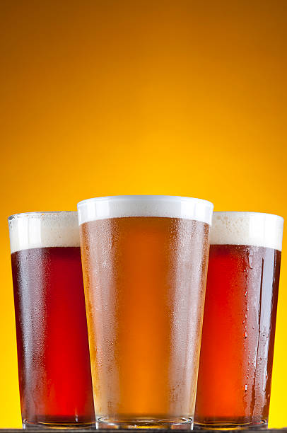 Variety of Cold Beer in Pint Glasses.
