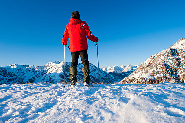 istock Reaching the mountain peak in winter 185126277