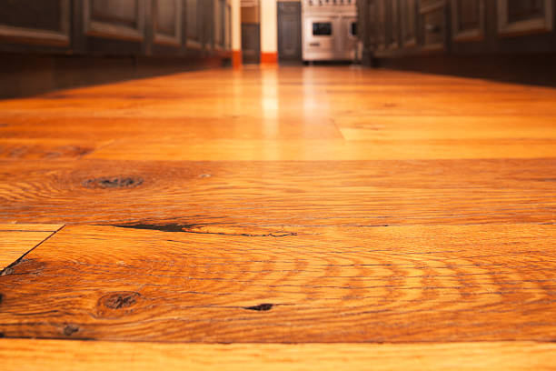 Reclaimed hardwood timber floor in kitchen. stock photo