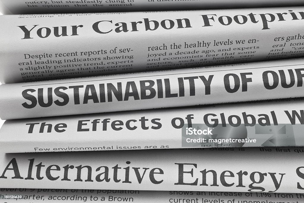 Los titulares sobre cuestiones medioambientales, en primer plano - Foto de stock de Recursos sostenibles libre de derechos