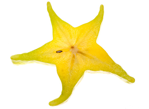 A slice of star fruit isolated on white background.Please see my other fruit related images in the below lightbox: